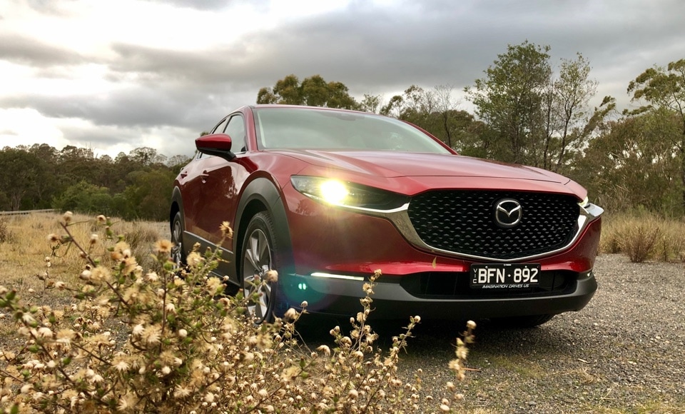Soul Red Crystal Metallic Mazda CX-30 at the start of its Sydney to Melbourne road trip