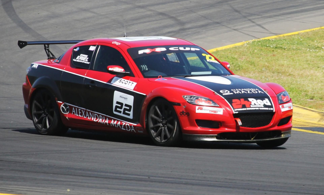 Mazda RX‑8 Cup Stiaan Kriel's car, the 2025 champion, cornering at Sydney Motorsport Park in Australia.