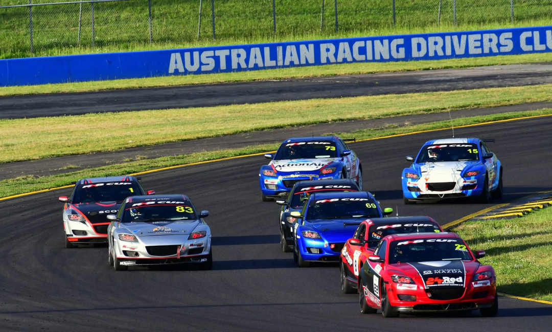 Group of Mazda RX-8 cars during the 2025 Mazda RX-8 Cup.