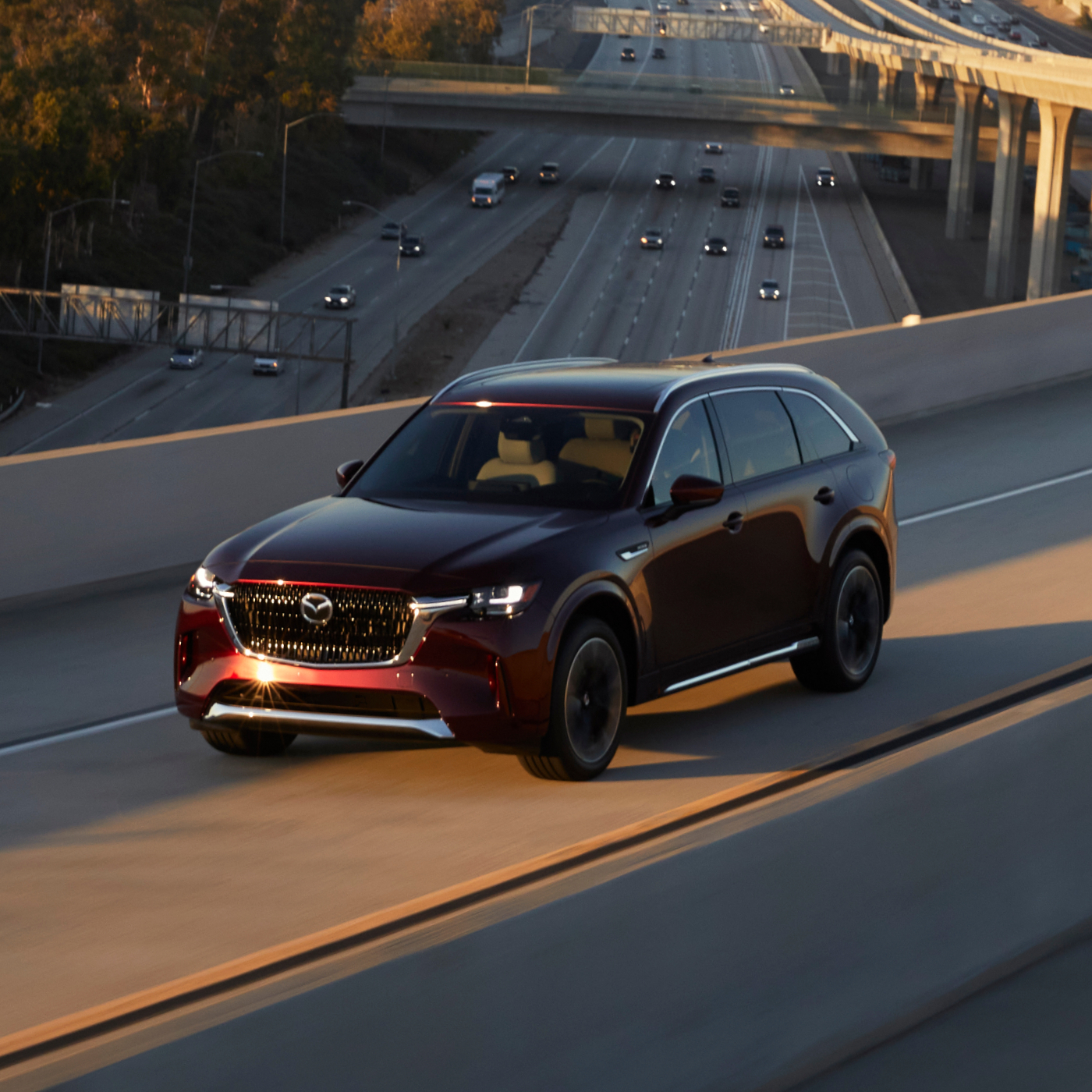 A fixed rate car loan could have you take the highway in your new Mazda CX 90.