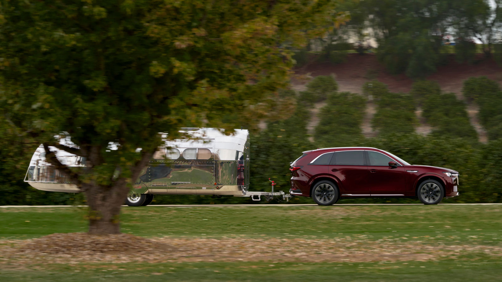 Mazda CX-90 family SUV towing caravan