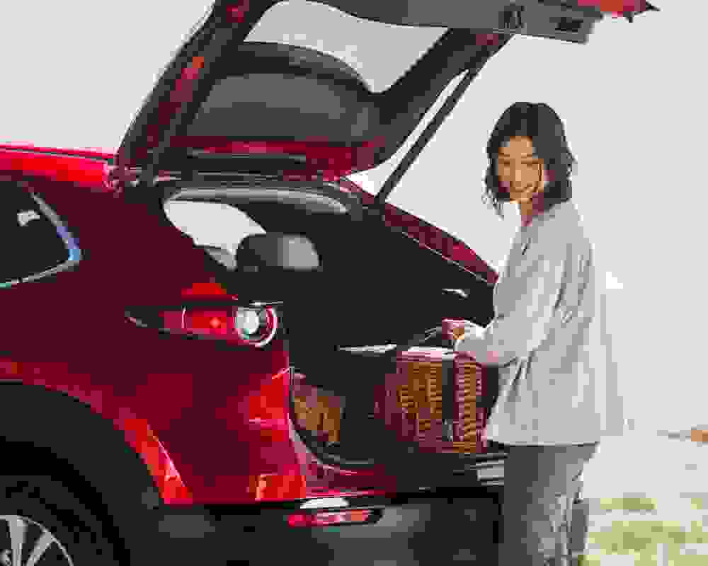 Woman enjoying flexibility with Mazda’s car finance options