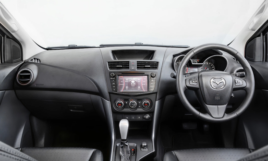 Leather-trimmed cabin of a second-generation Mazda BT-50 GT dual-cab