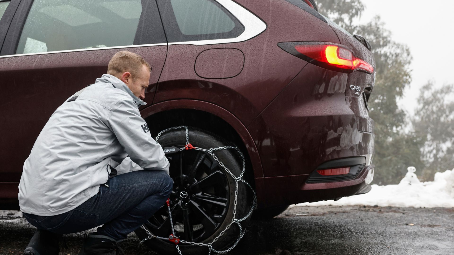 Snow chains can make or break a great winter holiday. Here is how to fit them to the Mazda CX-80.