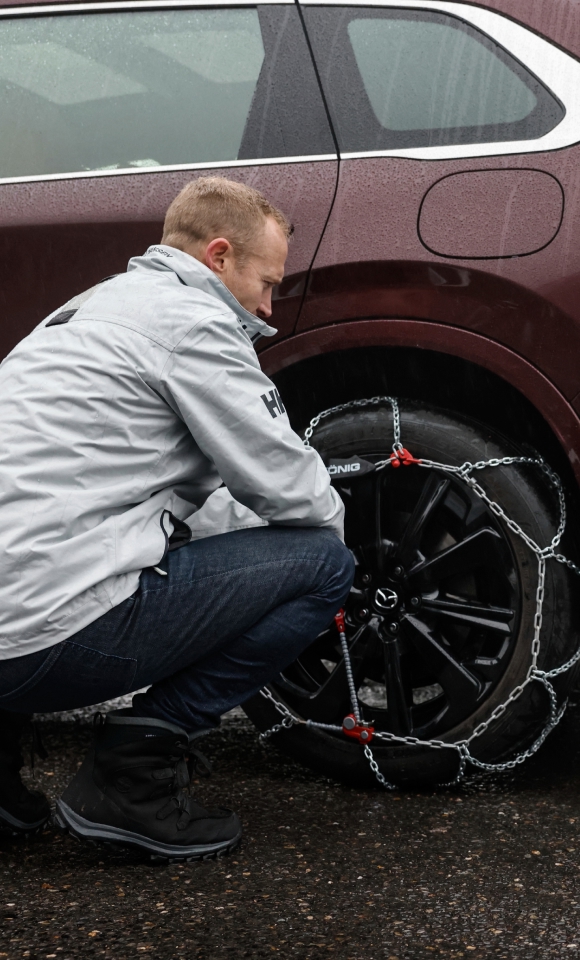 Snow chains can make or break a great winter holiday. Here is how to fit them to the Mazda CX-80.