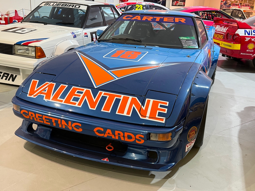 1983 Mazda RX-7; races include 1983 James Hardie 1000, Murray Carter & David Clements; livery restored to that race