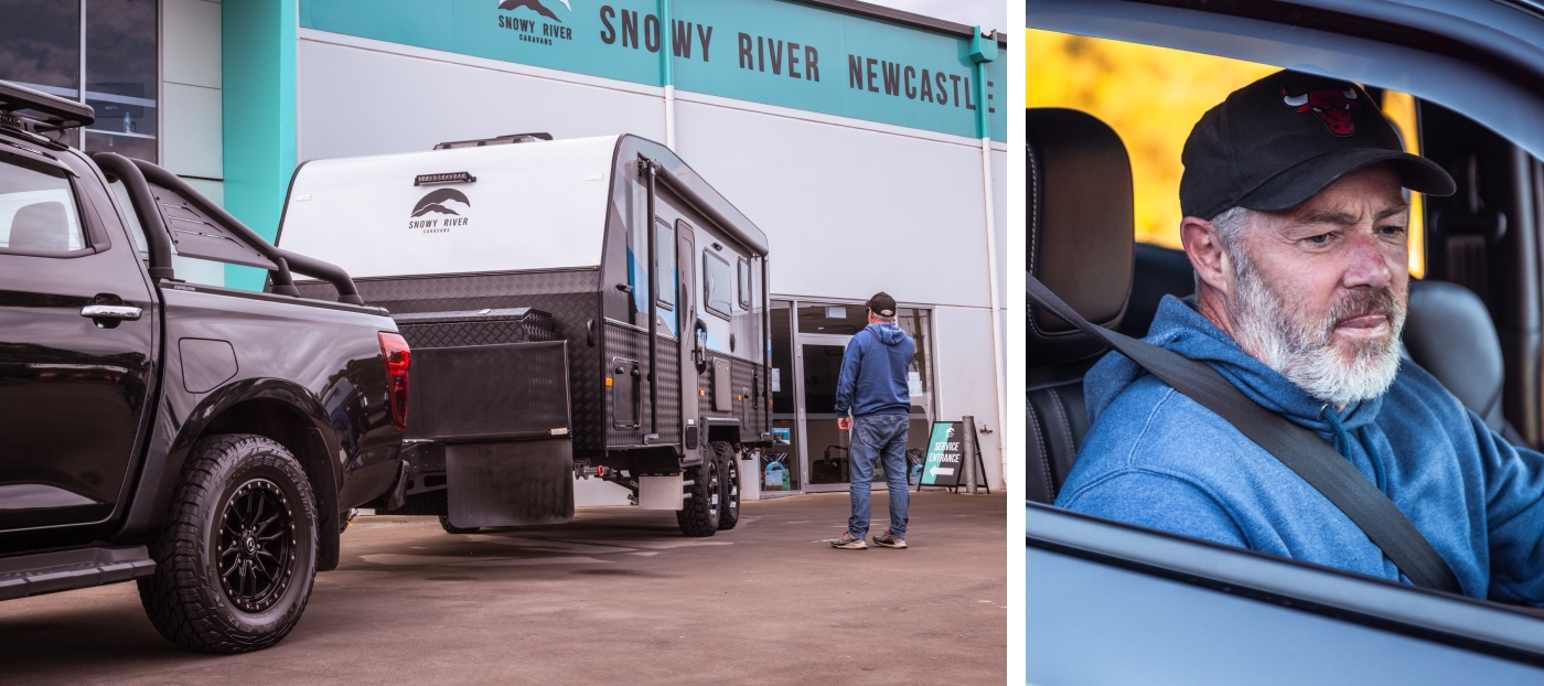 Left: Black pickup truck towing a Snowy River travel trailer outside a building labeled 'Snowy River Newcastle,' with a person standing nearby; Right: Close-up of a person in a blue hoodie and black cap sitting in the driver's seat, looking out the window.